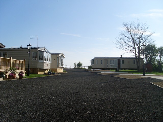Holiday homes with verandas beside the drive at Dover Caravan Park in 2009
